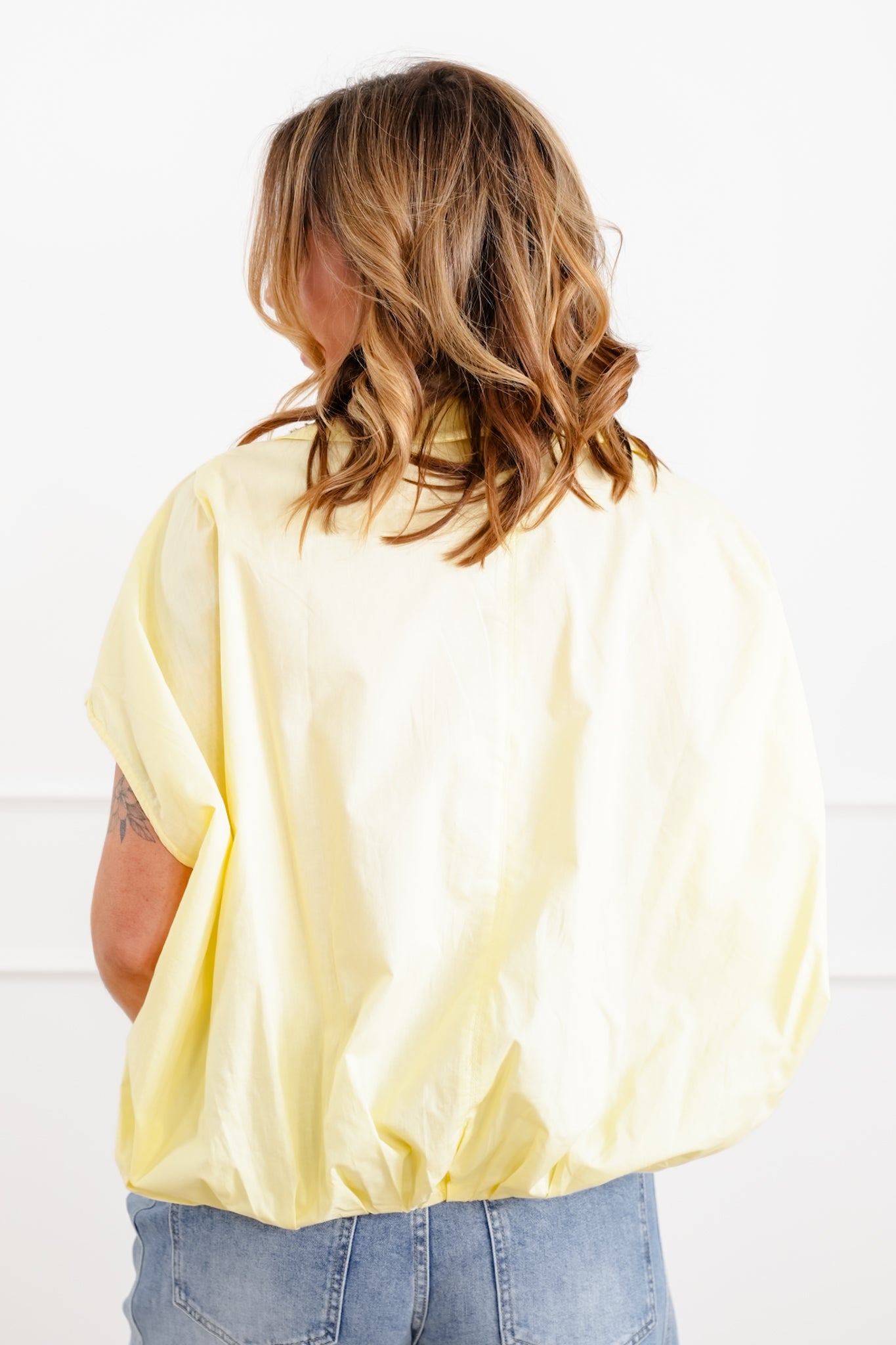 Short Sleeve Bubble Hem Button Down Blouse