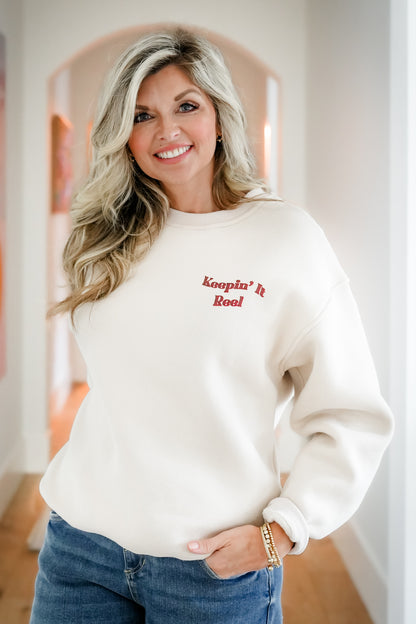 Long Sleeve "Keepin It Reel" Graphic Sweatshirt