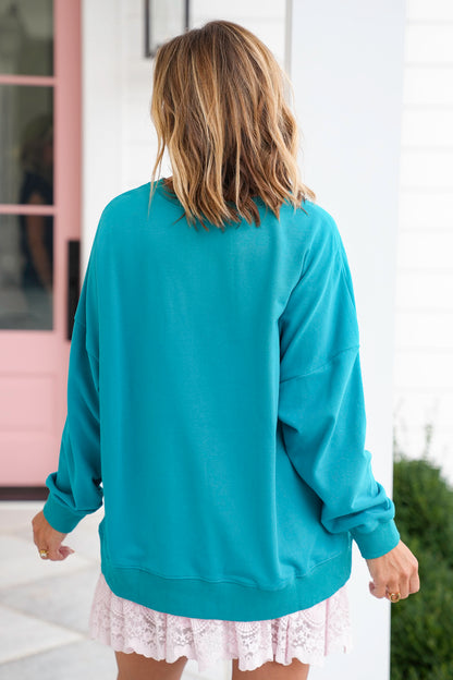 Long Sleeve Sweatshirt with Sequin Nutcrackers