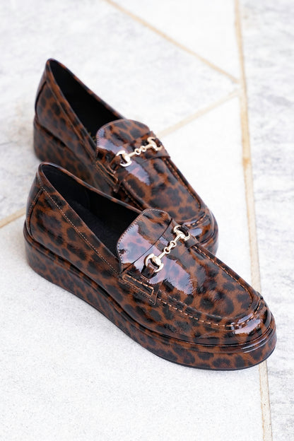 Glossy Chic Animal Print Patent Platform Loafer with Gold Accent