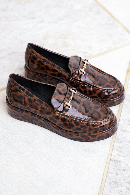 Glossy Chic Animal Print Patent Platform Loafer with Gold Accent