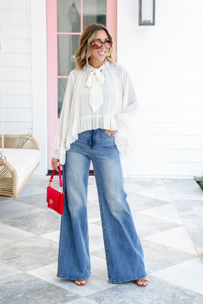 Plus/Reg Long Bell Sleeve Ruffle Blouse
