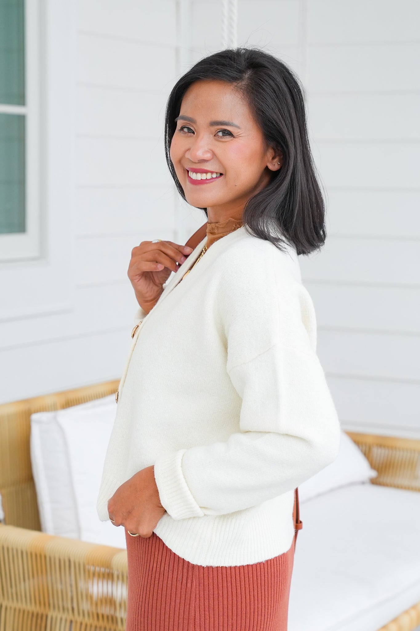 Long Sleeveless Cardigan with Heart Button Detail