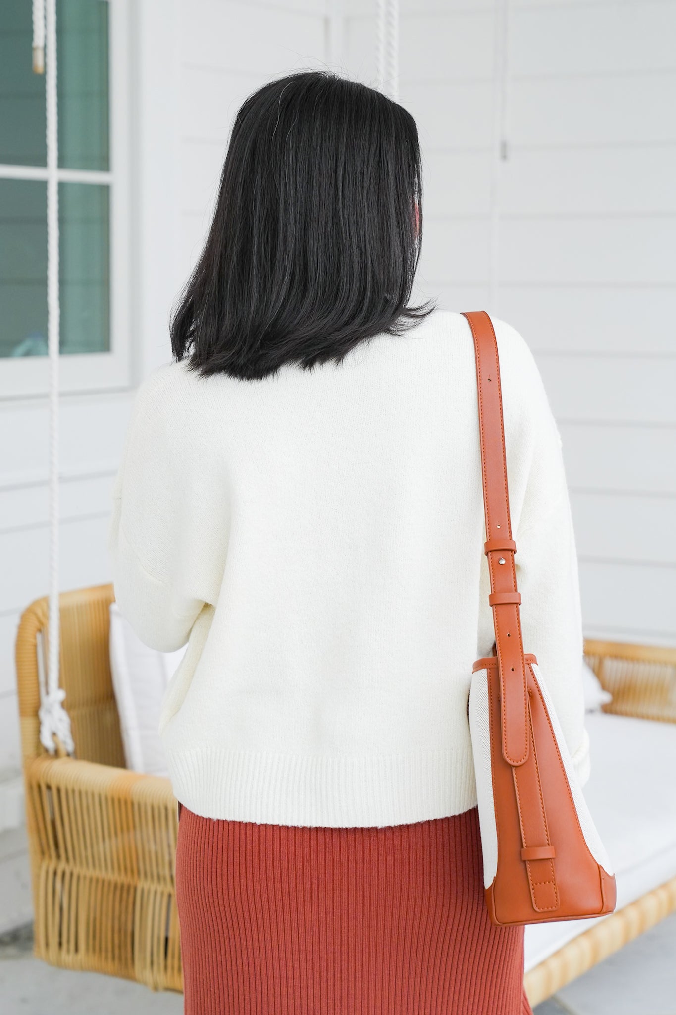 Long Sleeveless Cardigan with Heart Button Detail