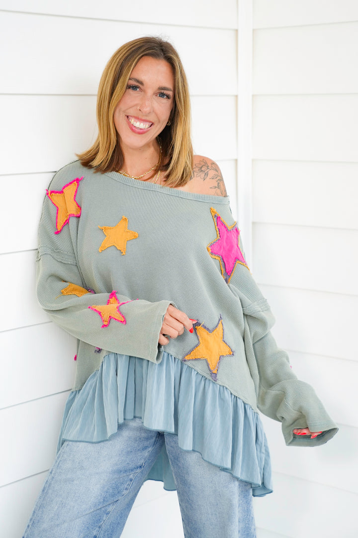 Star Patch Long Sleeve Ruffle Hem Top
