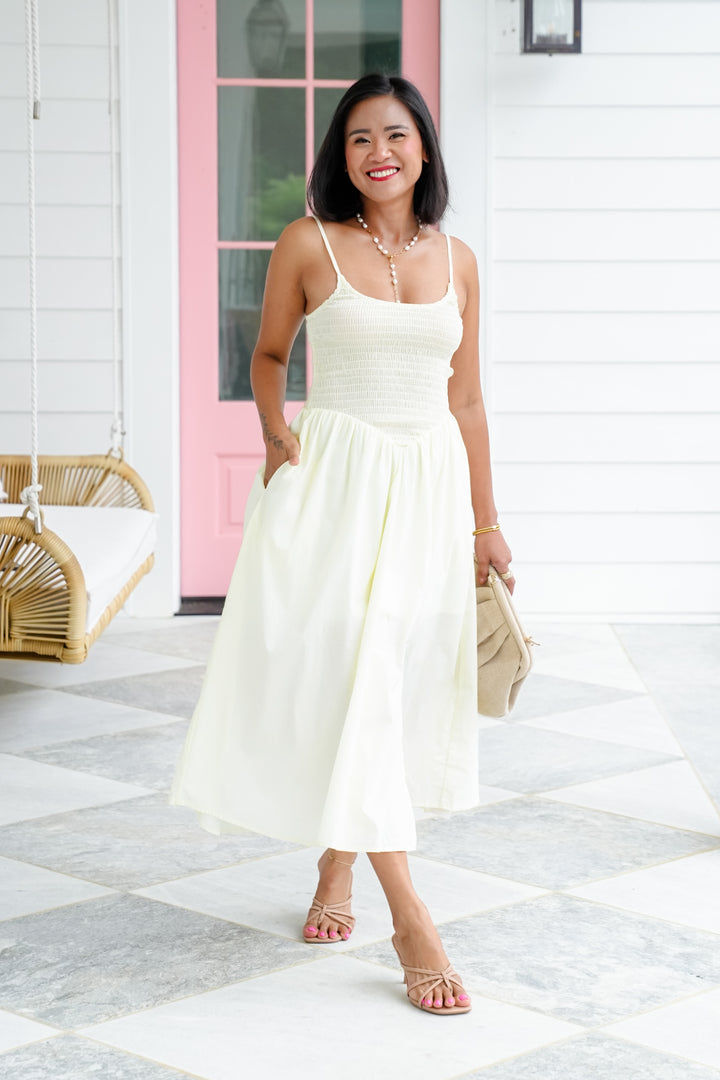 Cream Sleeveless Smocked Bodice Dress with Side Slit Detail