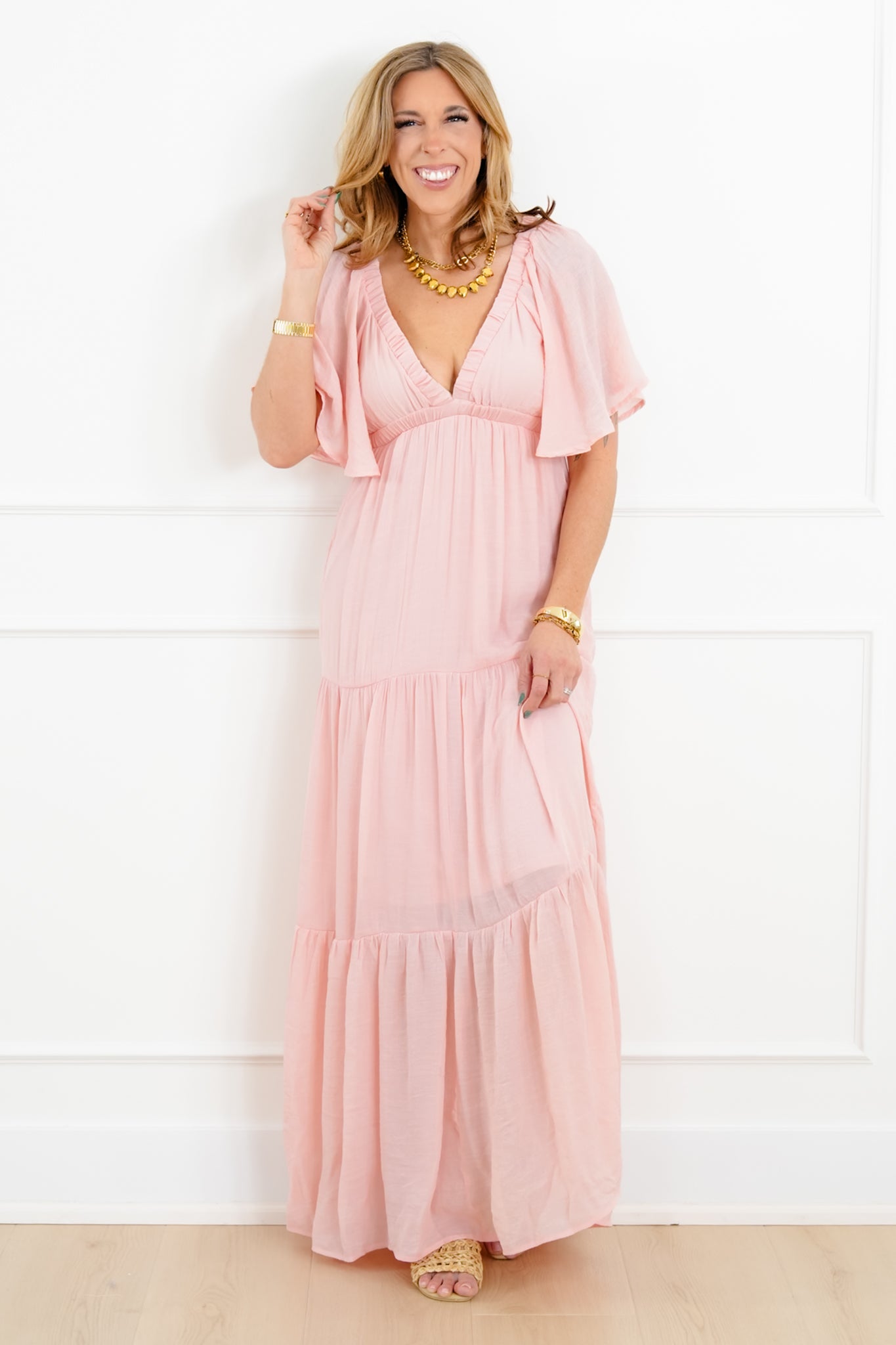 short maxi dress with sleeves Brittany Sleeve in Pink Floral Style with a pair of heels and gold earrings for a polished finish. Solid Short Sleeve V-Neck Tiered