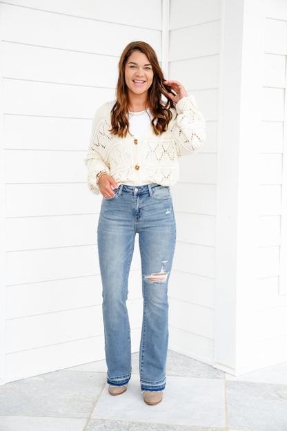 Restock Judy Blue Mid Rise Medium Wash Distressed Released Hem Bootcut Jeans