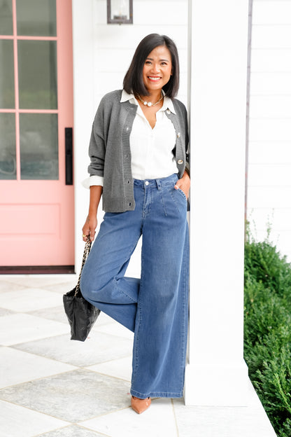 Risen Mid Rise Medium Wash Wide Leg Knit Jeans