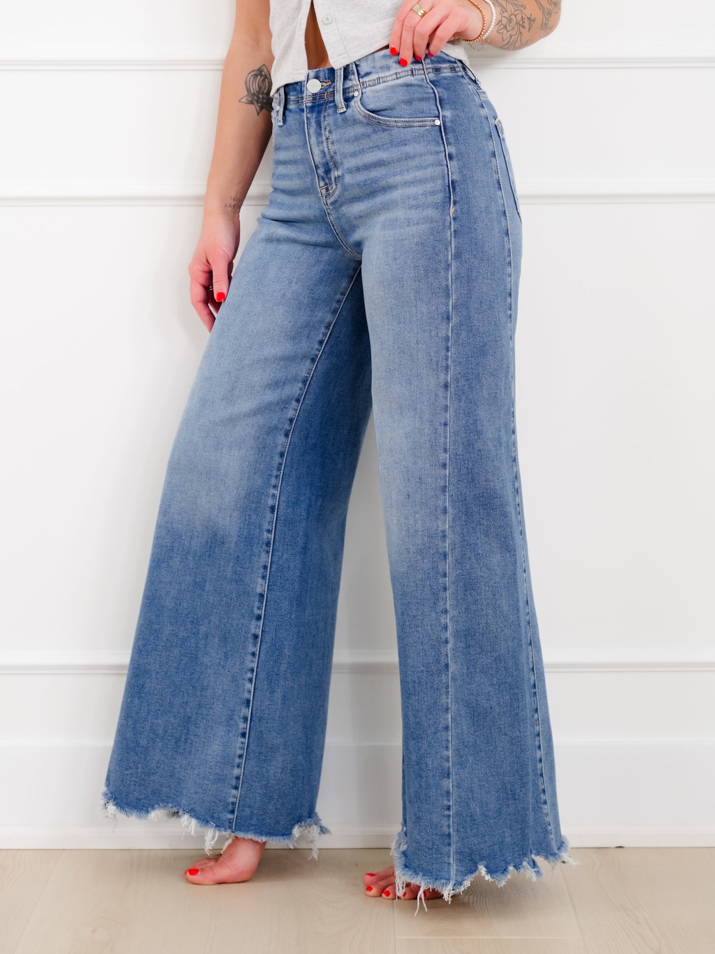 Risen High Rise Medium Wash Wide Leg Jeans