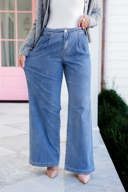Risen Mid Rise Medium Wash Relaxed Waist Wide Leg Jeans