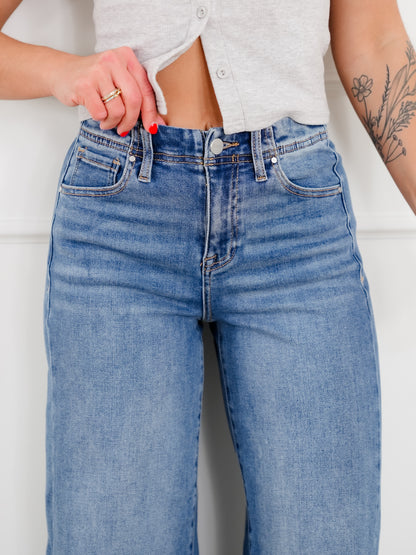 Risen High Rise Medium Wash Wide Leg Jeans