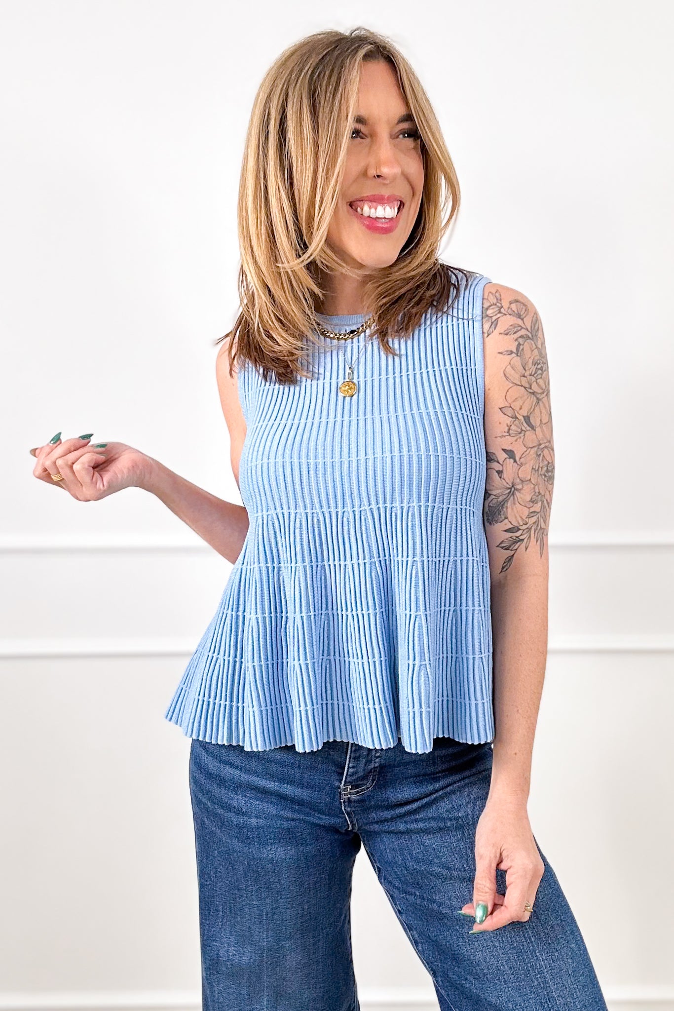 Ribbed Knit Sleeveless Flared Top