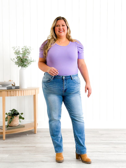 Risen Mid Rise Medium Wash Relaxed Skinny Jeans
