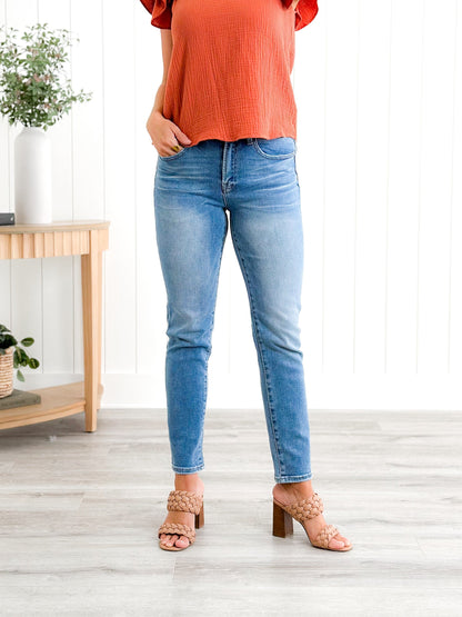 Risen Mid Rise Medium Wash Relaxed Skinny Jeans