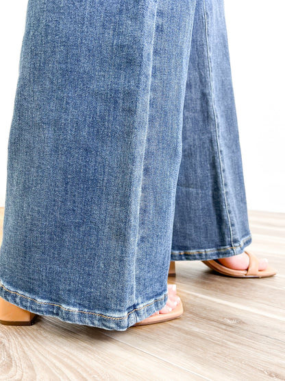 Risen Medium Wash Mid Rise Flap Straight Jeans
