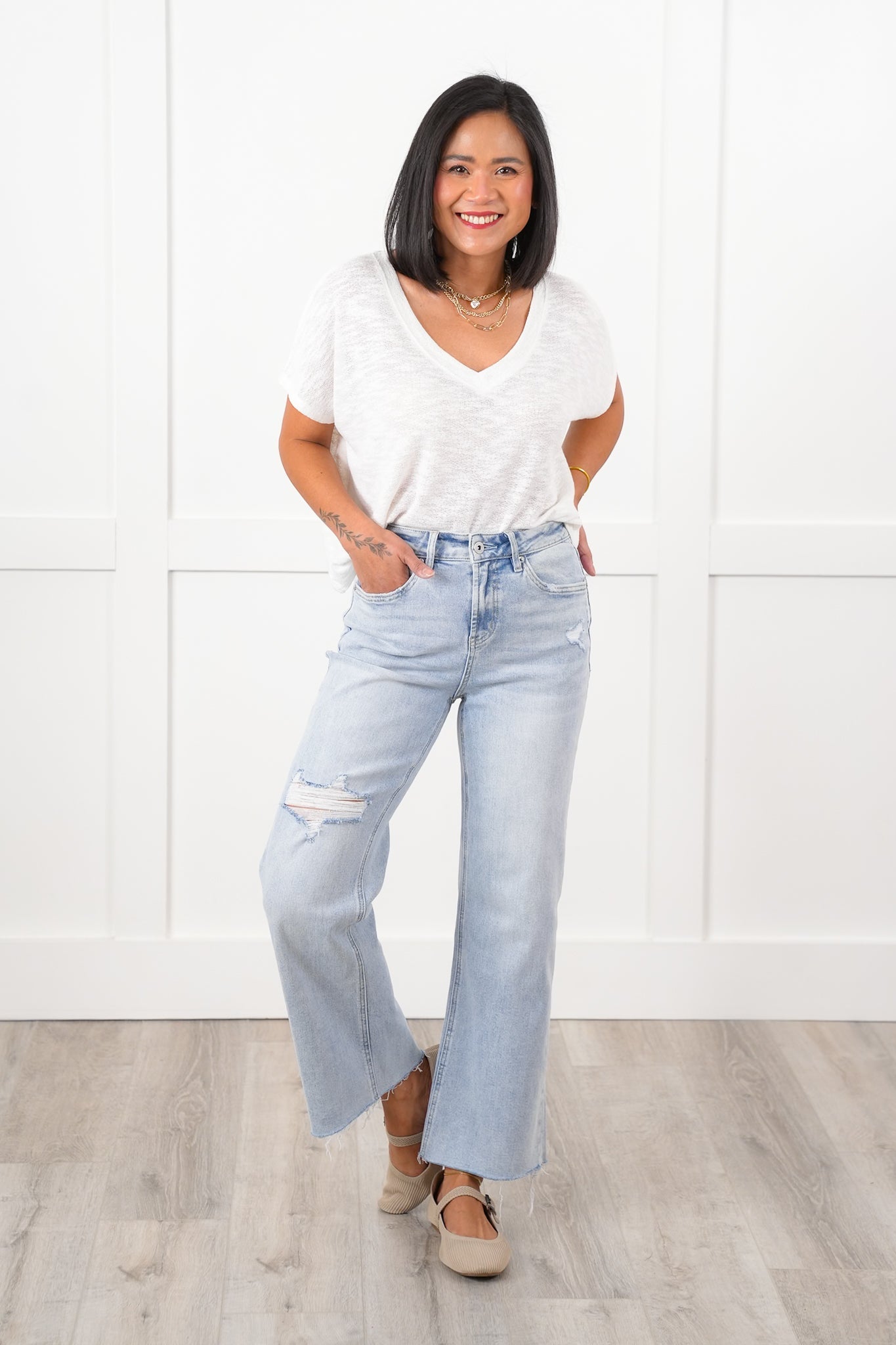 Mica High Rise Light Wash Raw Hem Wide Leg Jeans