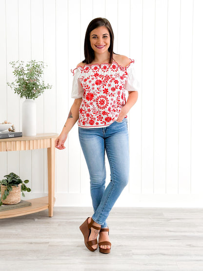 Risen Mid Rise Medium Wash Relaxed Skinny Jeans