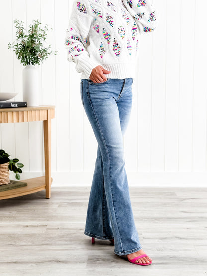 Freckled Poppy X Risen  Wildest Dreams Mid Rise Medium Wash Basic Non Distressed Flare Jeans